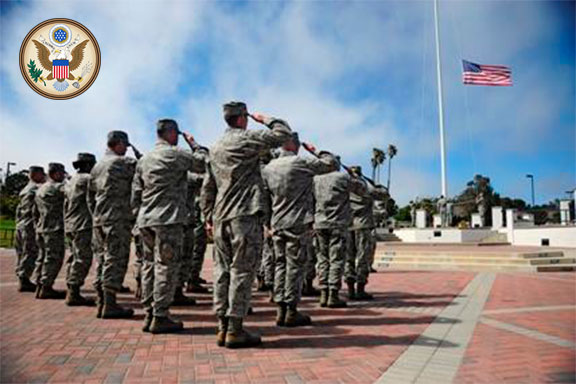 Military Members Saluting American Flag